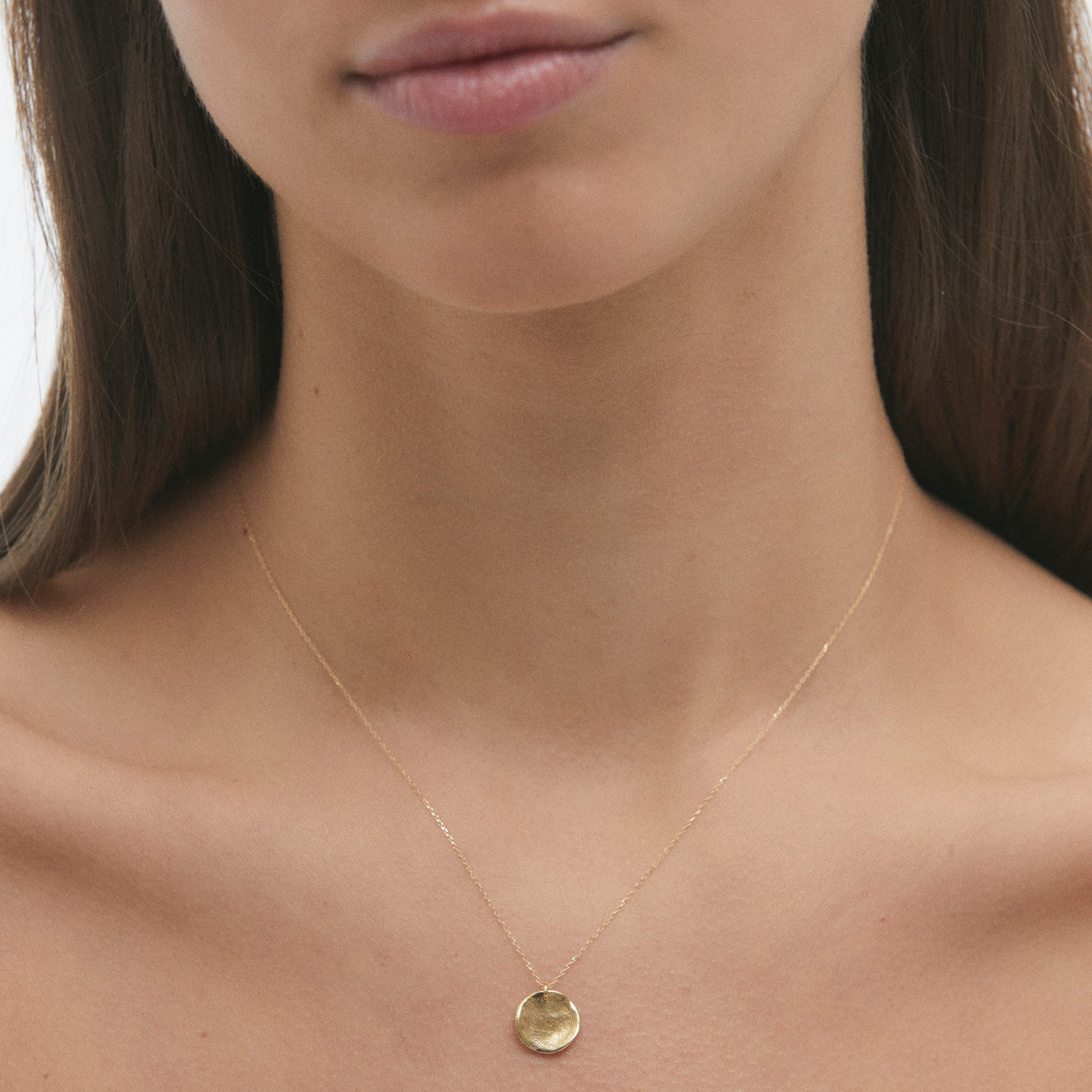 Footprint Pendant